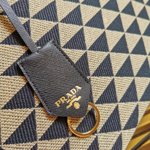 Pra*a small symbole jacquard fabric handbag