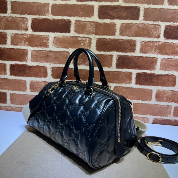 G*u*i gg matelassé leather top handle bag