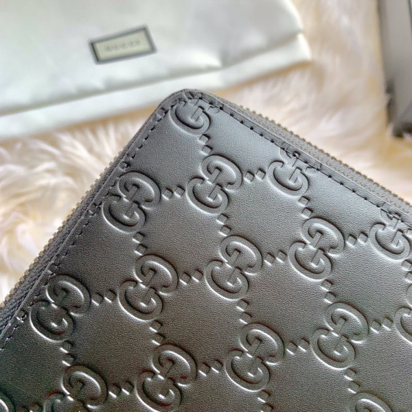 G*u*i leather zip around wallet