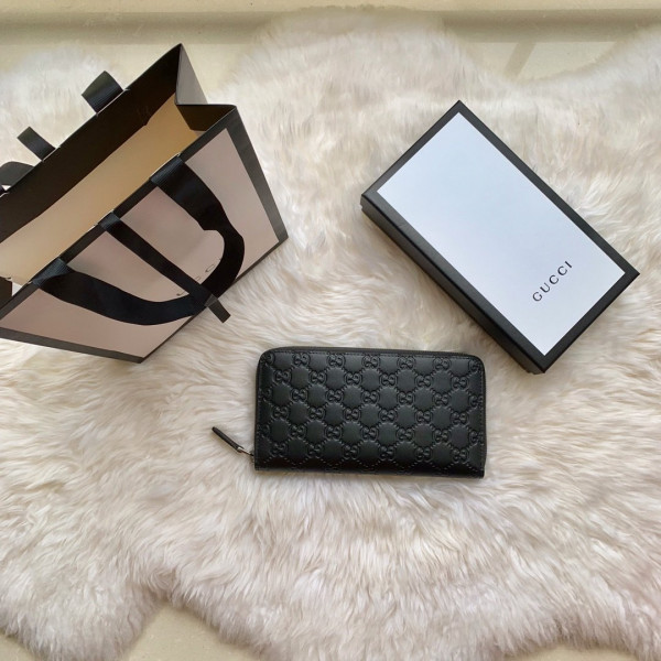 G*u*i leather zip around wallet