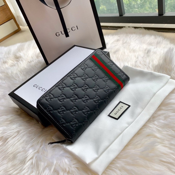 G*u*i leather zip around wallet