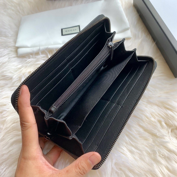G*u*i leather zip around wallet