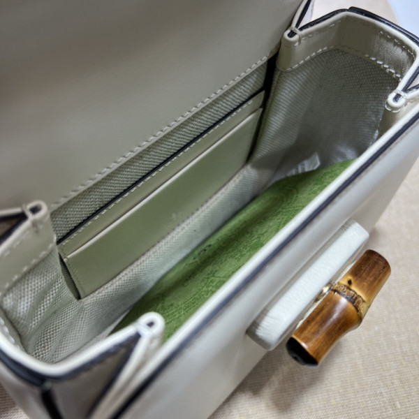 G*u*i mini top handle bag with bamboo