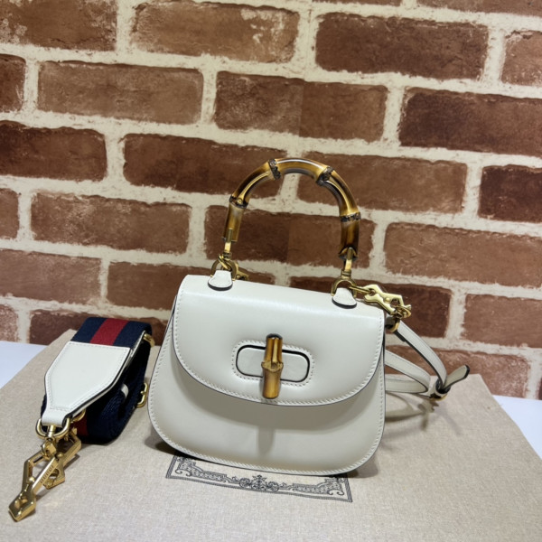 G*u*i mini top handle bag with bamboo
