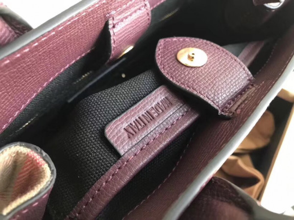 B**rry the small banner in leather and house check