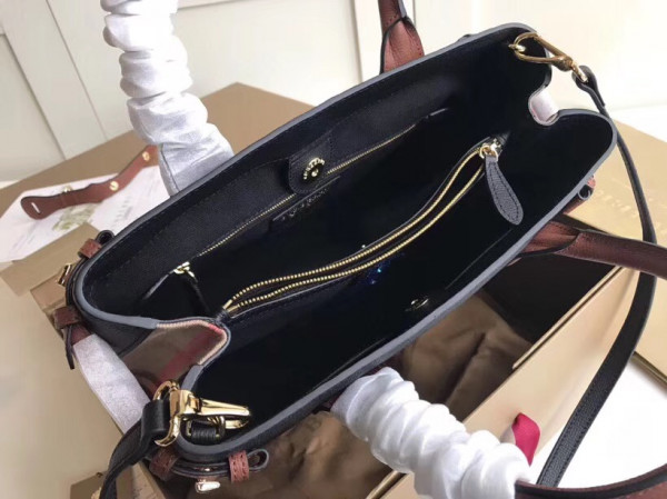 B**rry the medium banner in leather and house check