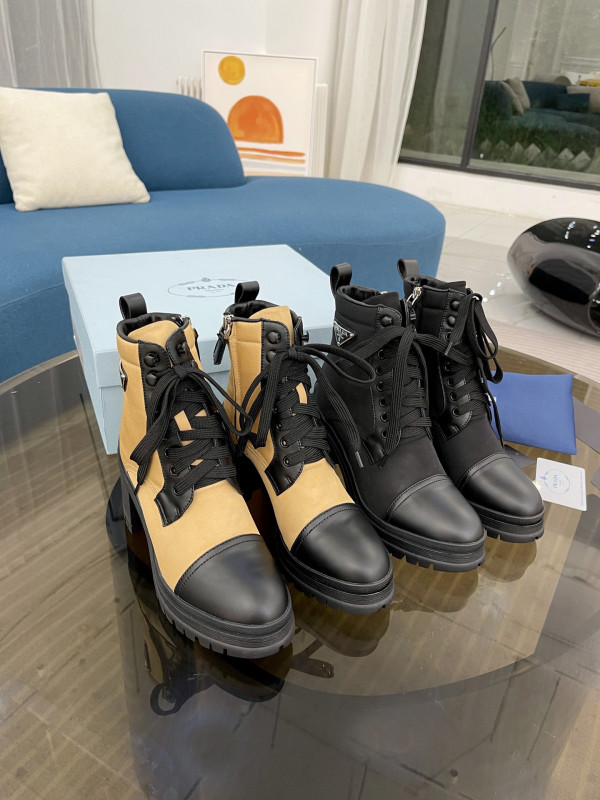 Pra*a brushed leather and nylon laced booties
