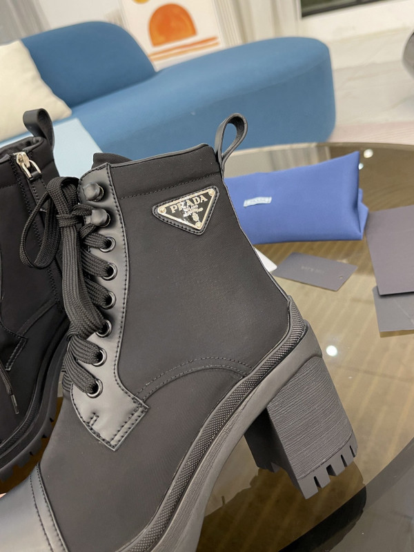 Pra*a brushed leather and nylon laced booties