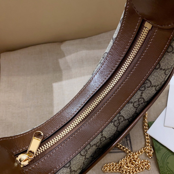G*u*i half-moon-shaped mini bag with interlocking g