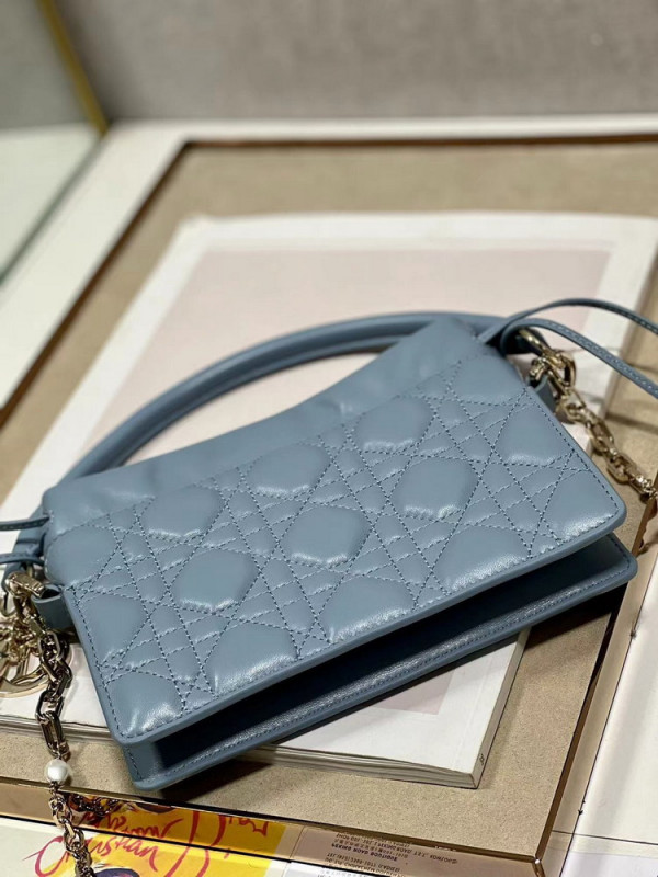 lady D*or top handle drawstring mini bag