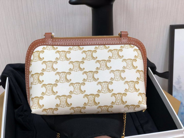 Ce**e clutch on chain in triomphe canvas