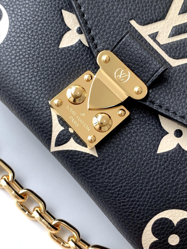 l**is V*t*n pochette metis east west
