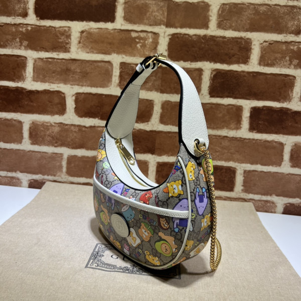 G*u*i gg marmont half-moon-shaped mini bag