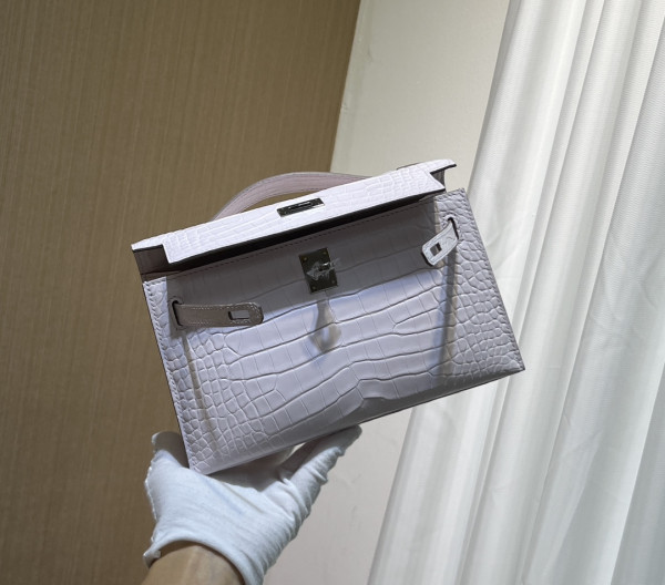 H**mes kelly pochette