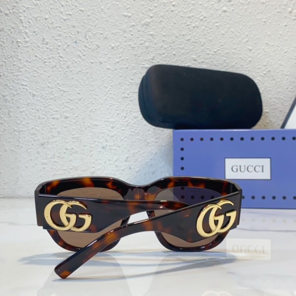 G*u*i sunglasses