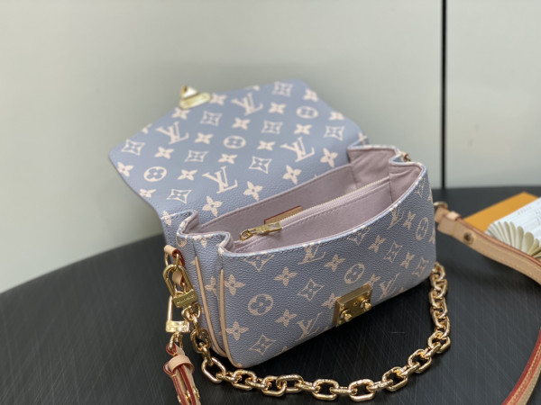 l**is V*t*n pochette metis east west